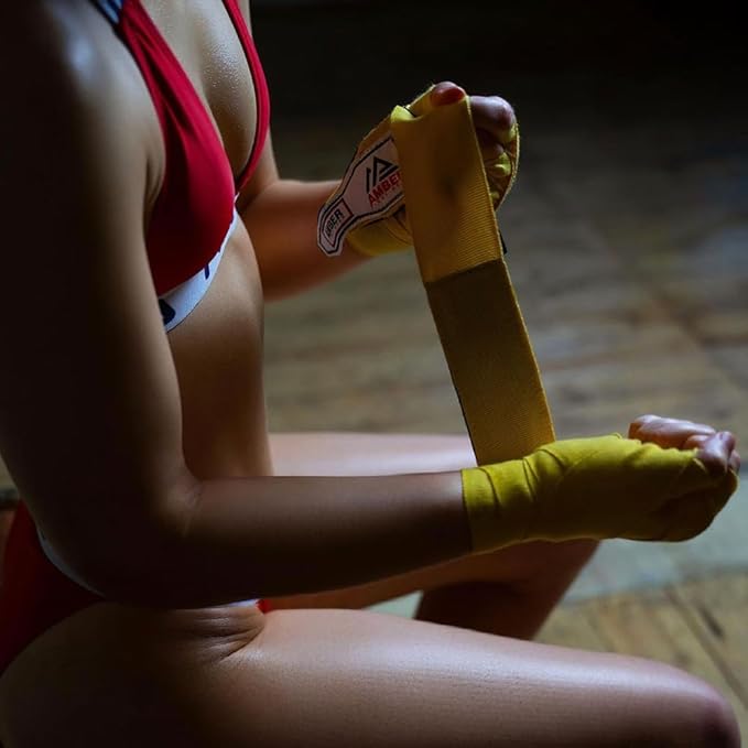 Amber Sporting Goods Portable Metal Easy Hand Wrap Roller Fits All Lengths Boxing &amp; MMA Size Hand Wraps Keeps Hand Wraps Straight and Wrinkle Free