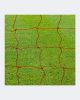 Durable orange soccer goal net with red lines on grass